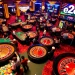 Experience the thrilling atmosphere at a casino featuring e28-themed poker and roulette tables, showcasing vibrant gaming action.