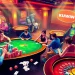 Thrilling casino atmosphere with players at the KUWIN poker table, showcasing excitement and strategy.